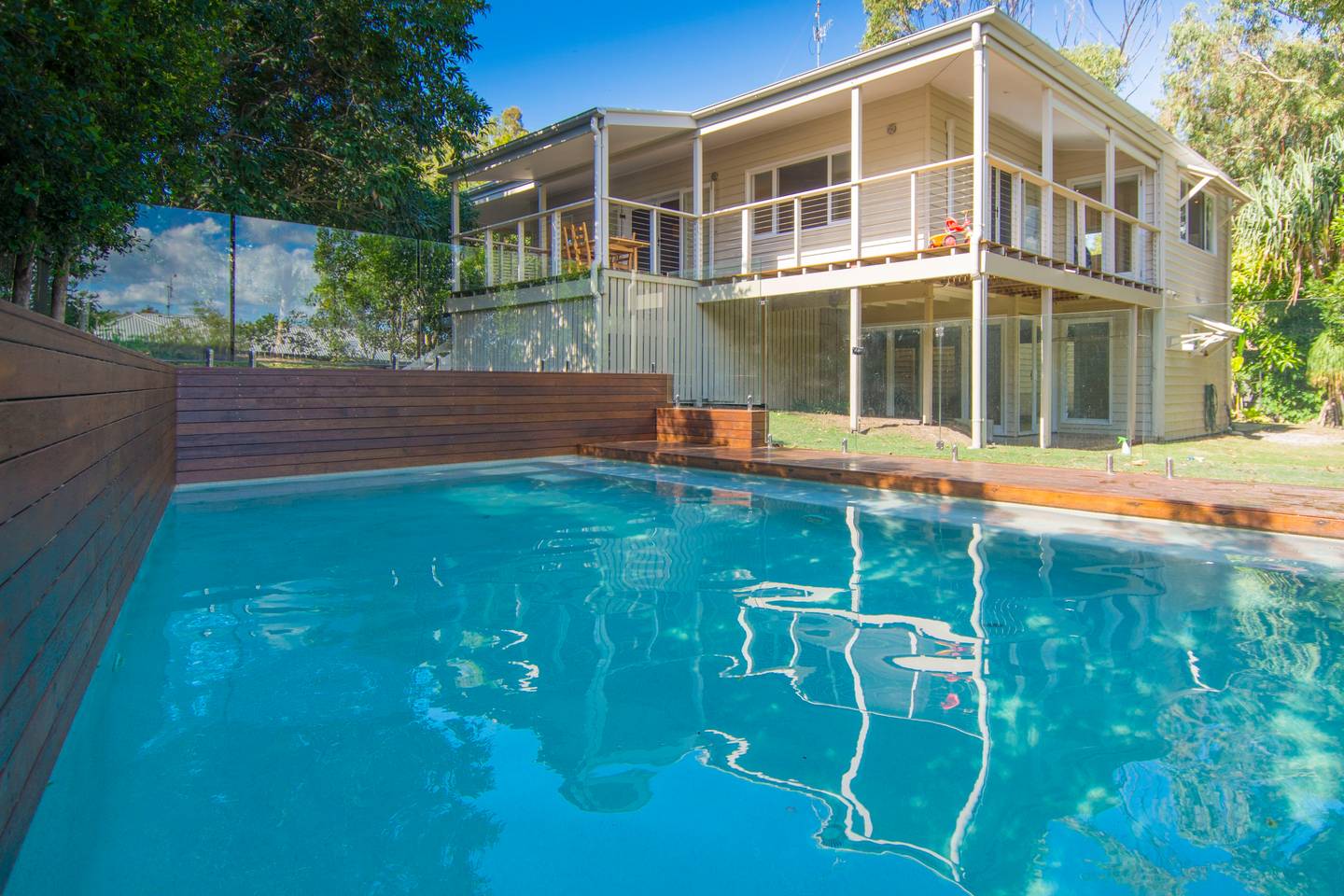 A large swimming pool in the yard of a property in Sunrise Beach